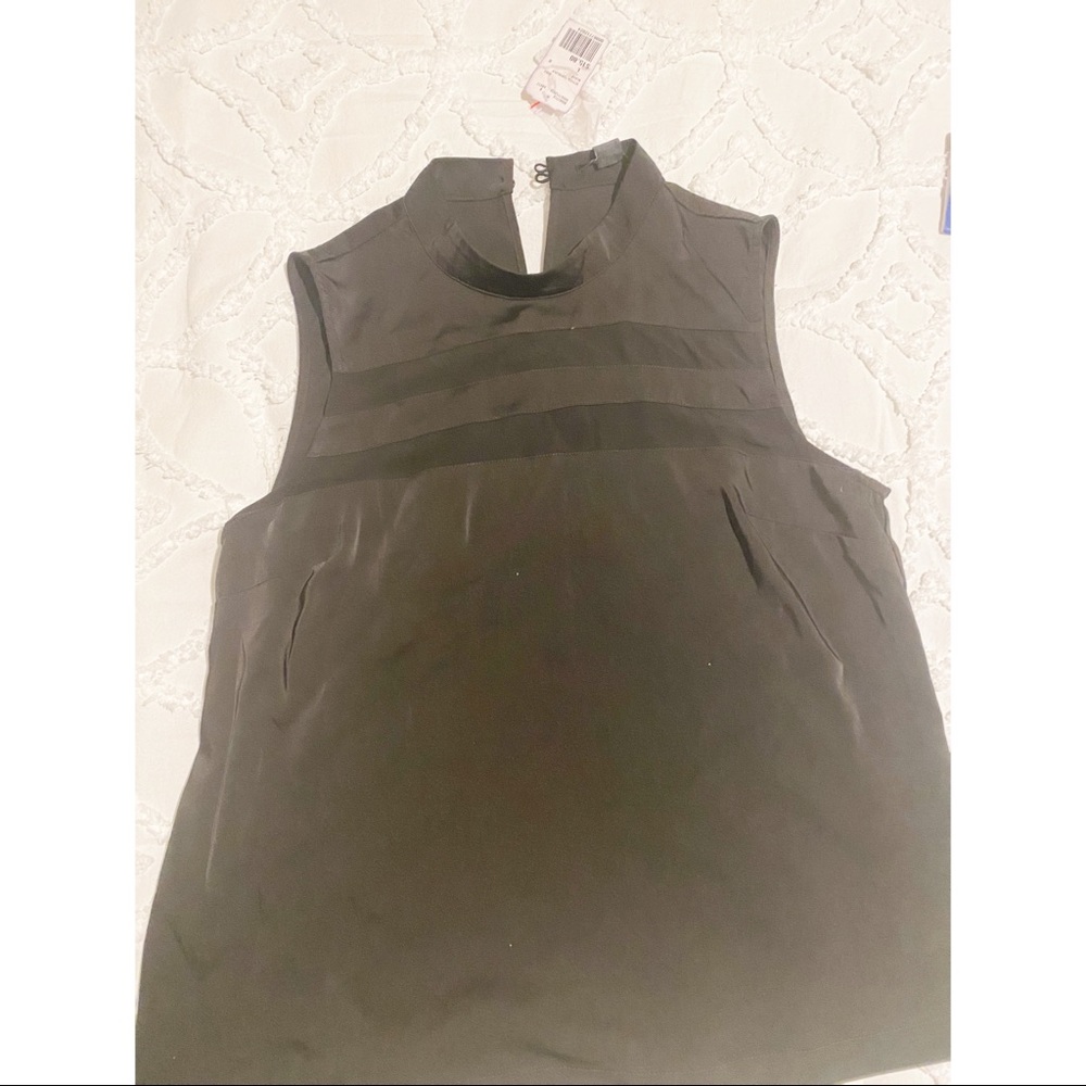 Black sleeveless blouse